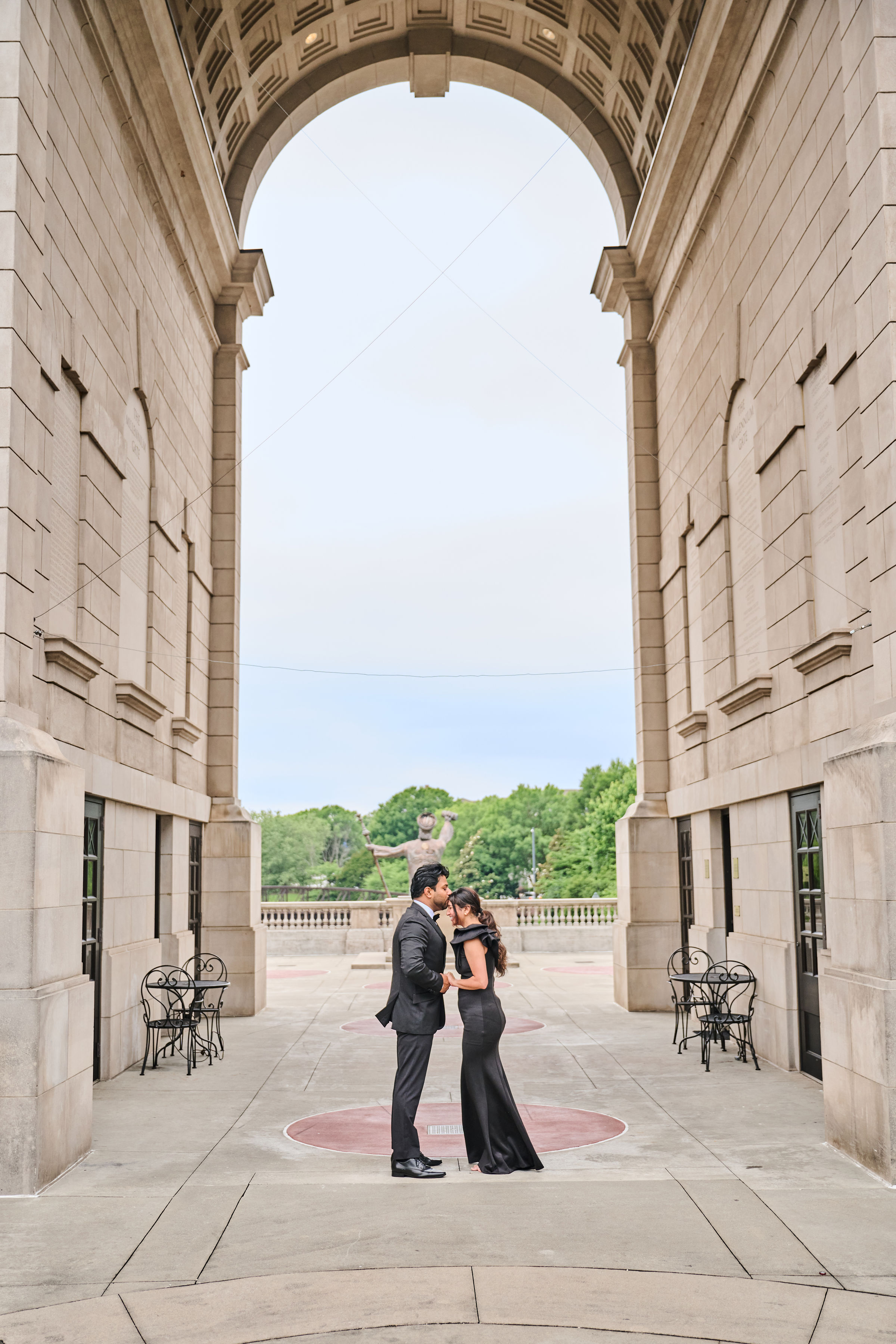 Rit and Shreya under an arch